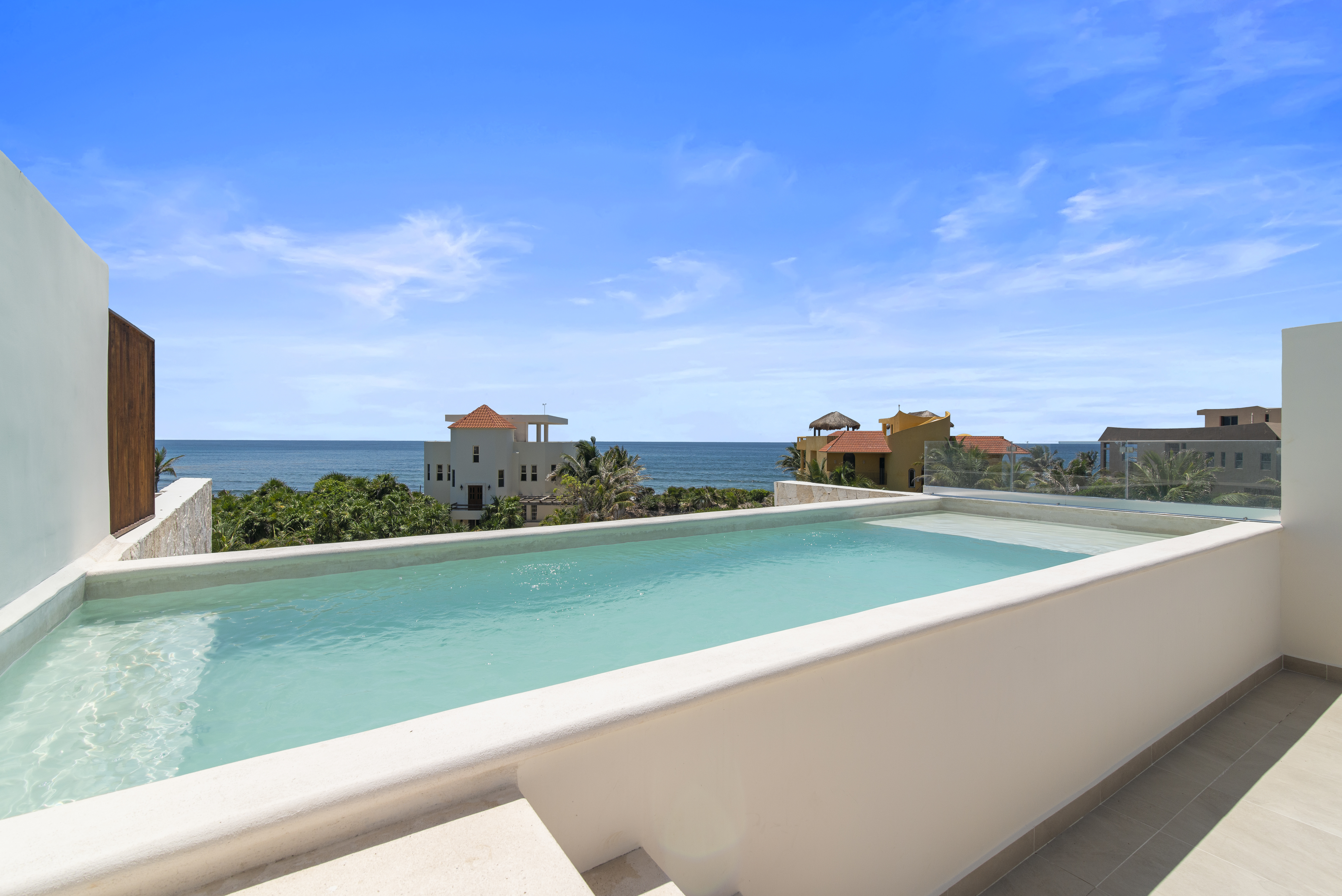 Seven rooftop pools with breathtaking Caribbean Sea views, perfect for relaxing above paradise.