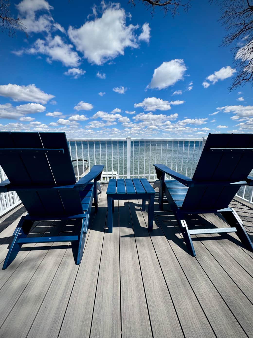 Seating area on lakeside deck with Lake Lizzie views