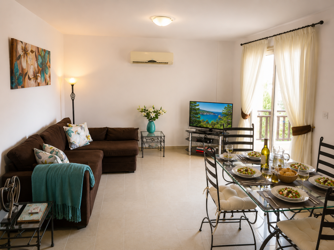 Open plan lounge dining area leading to expansive balcony
