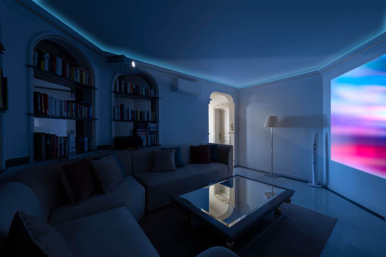 Home cinema with projector and library