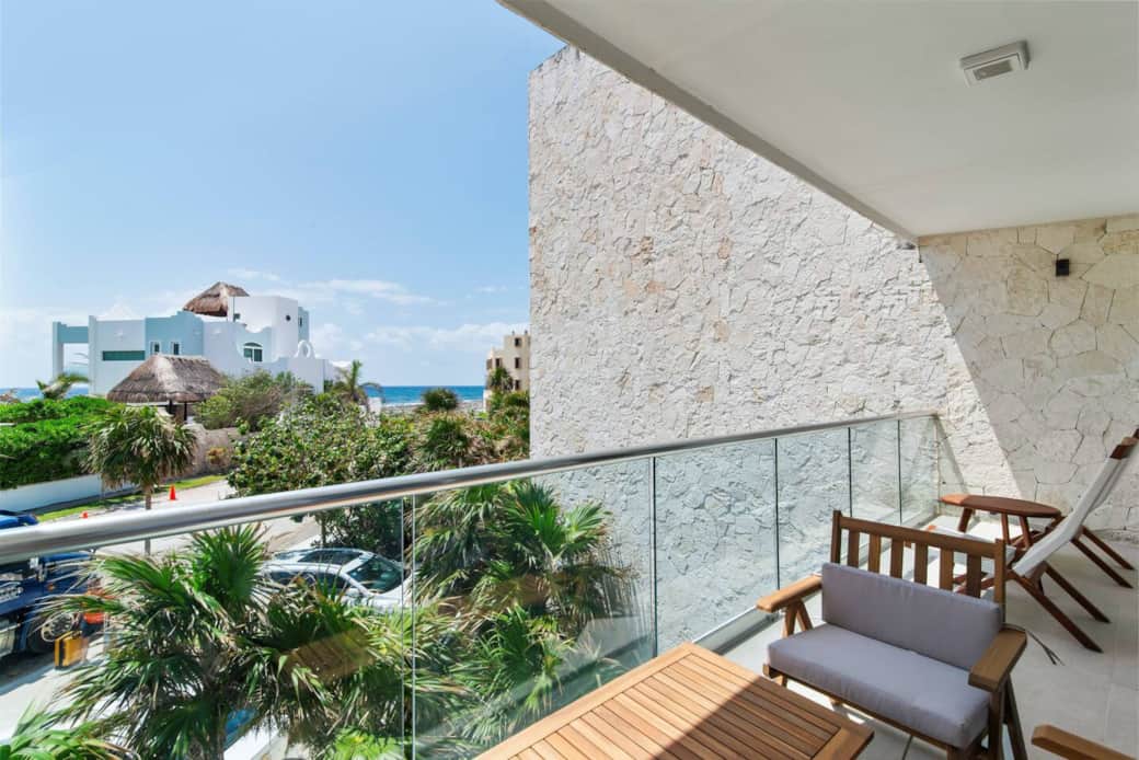 Private balcony off living room with sea breeze and stunning Caribbean views.