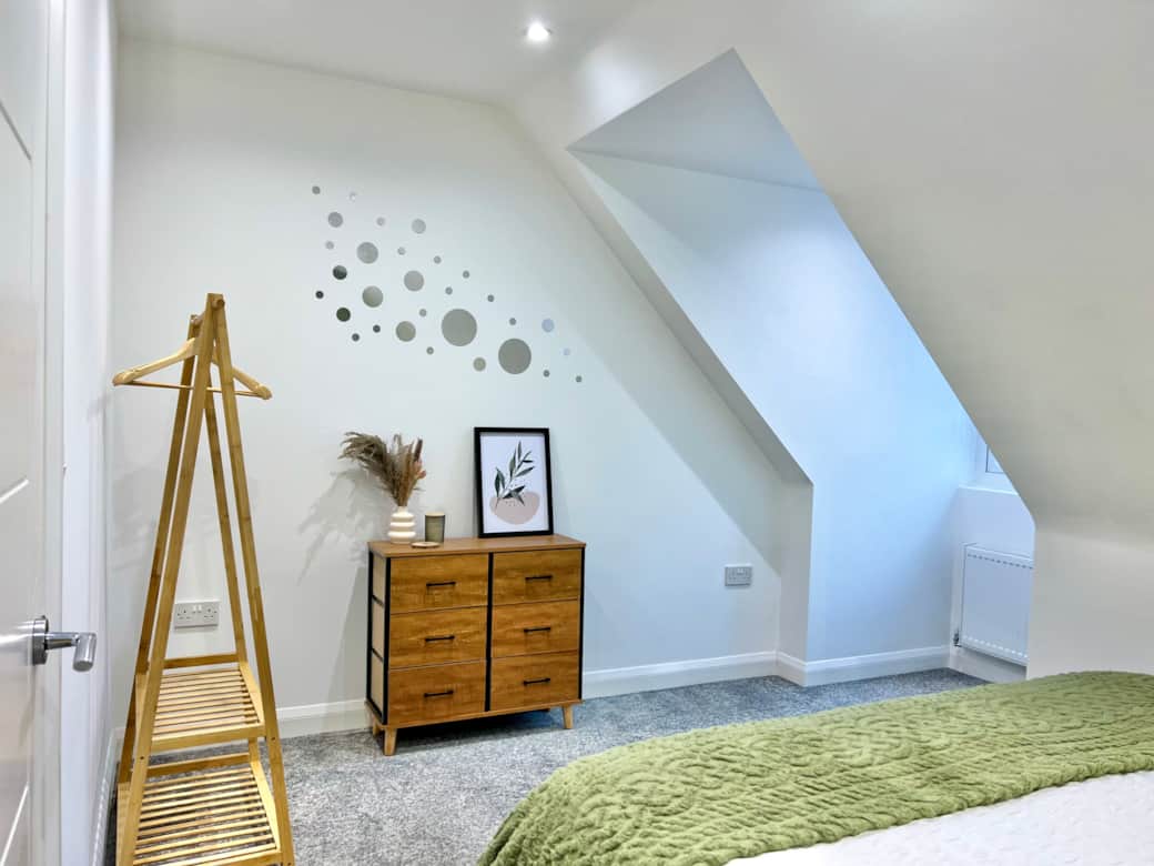 Bedroom 2: Storage with a window for natural light, clothes rail for hanging clothes