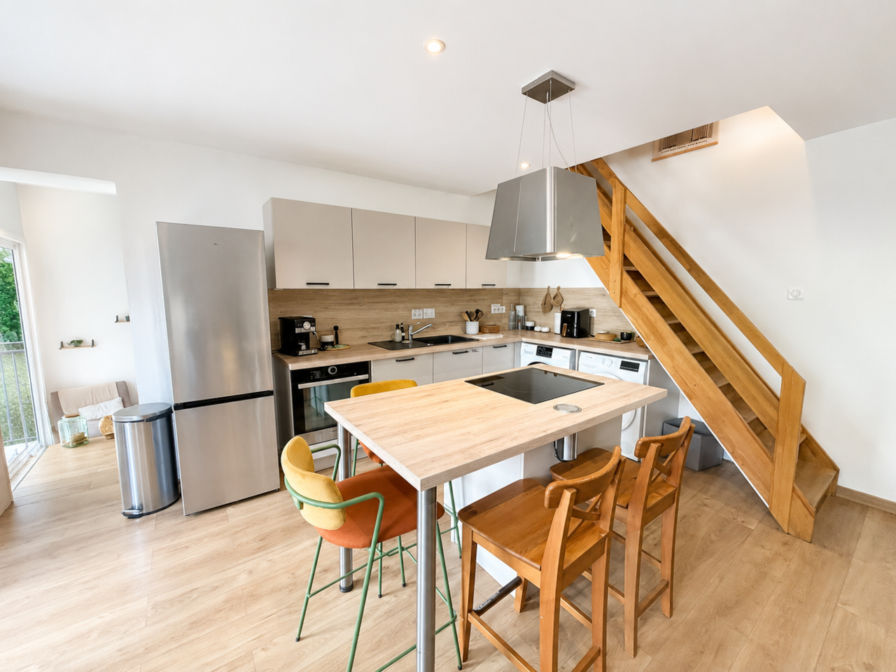 kitchen, dining table, washing machine, dryer, dishwasher, coffee machine, fridge