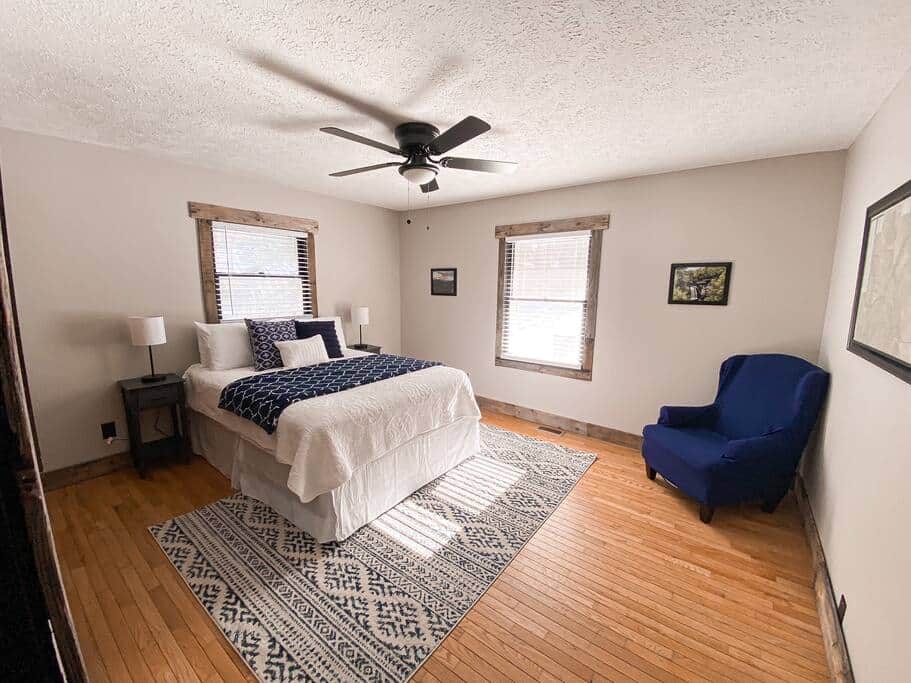 This bedroom provides a queen bed and a large closet for storage.