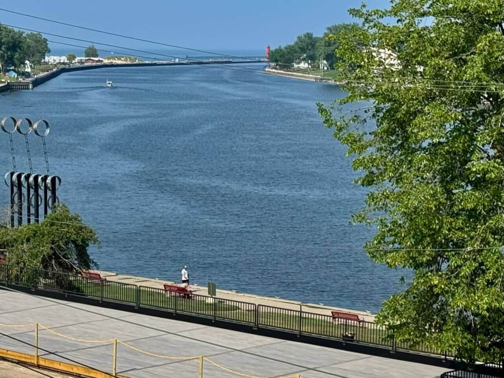 The Grand River Channel in Grand Haven, Michigan, connects the Grand River to Lake Michigan and is p