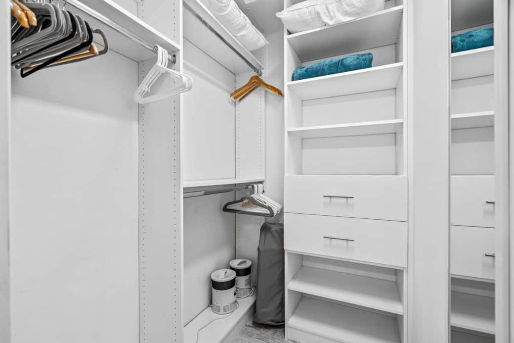 Walk-In Master Closet with hanging, shelves and drawers. Walk-In Master Closet with hanging, shelves and drawers.