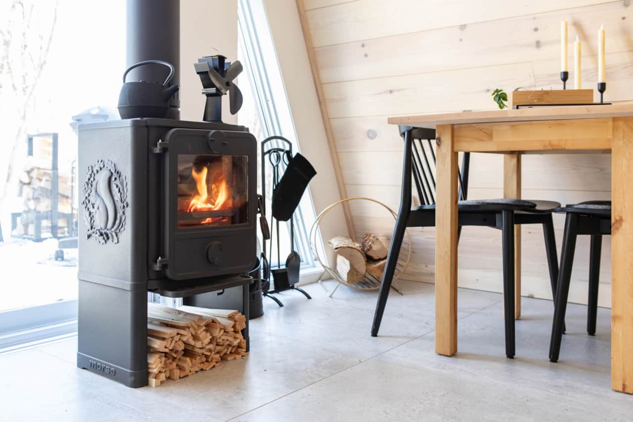Wood stove—the cozy heart of the cabin. Photo credit: @NorthParkFilms