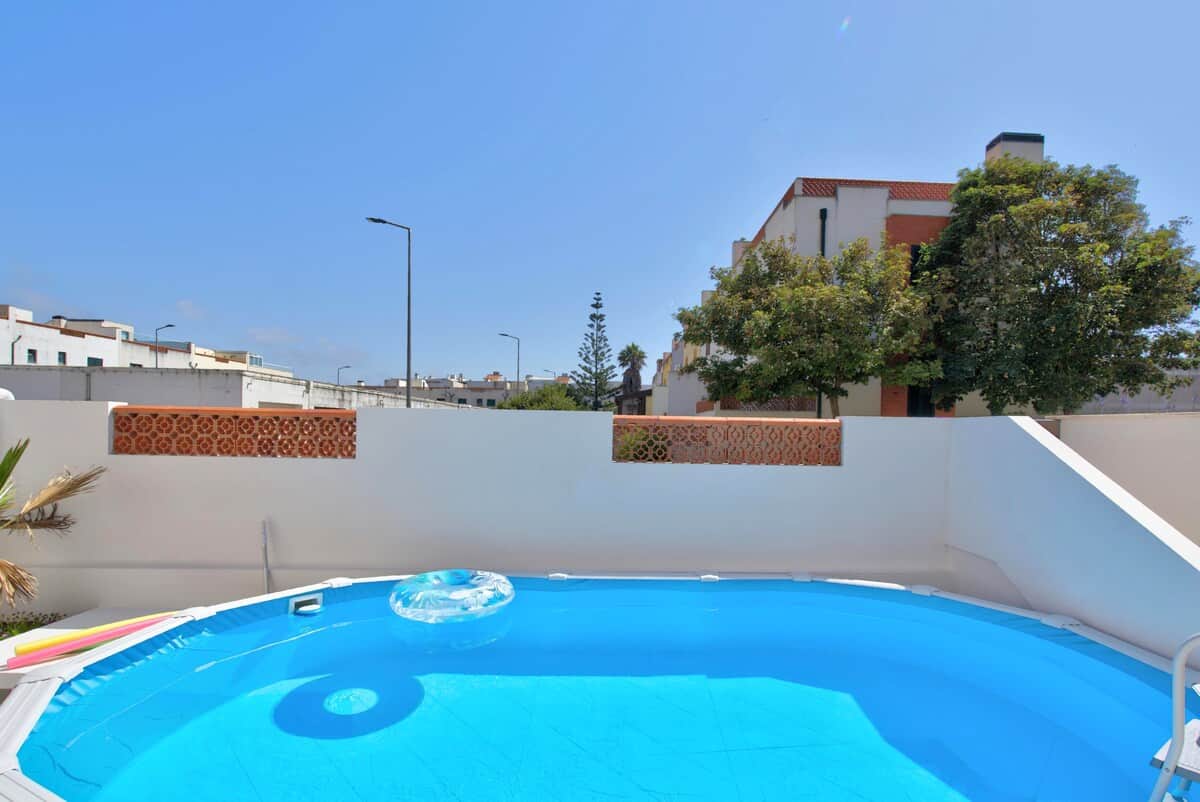 Private swimming pool and patio area, perfect for cooling off under the Portuguese sun.