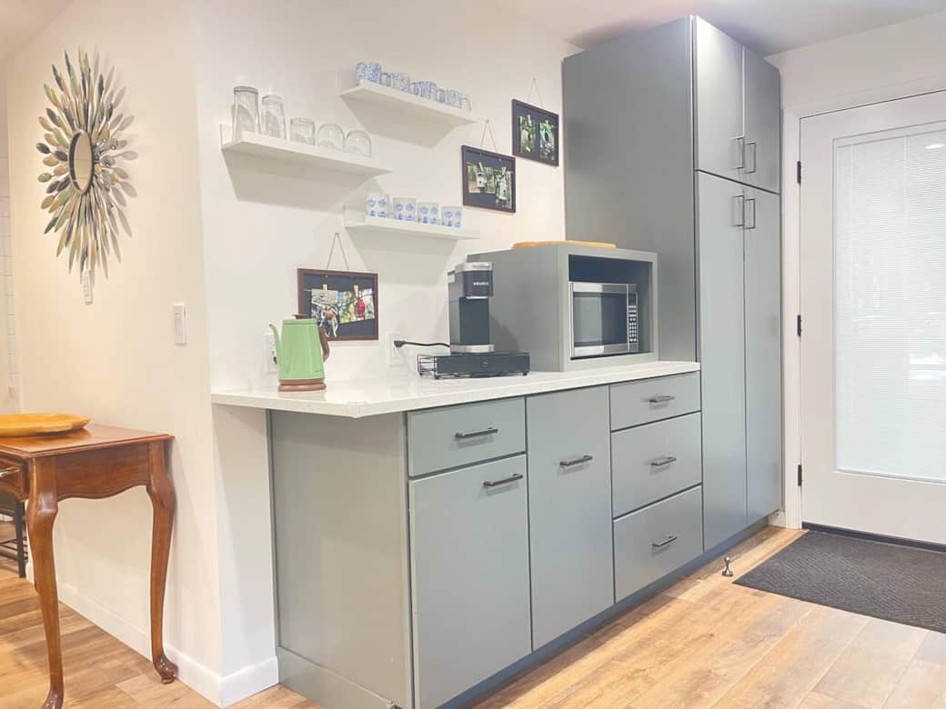 Cook in a contemporary kitchen with advanced technology and thoughtful amenities.