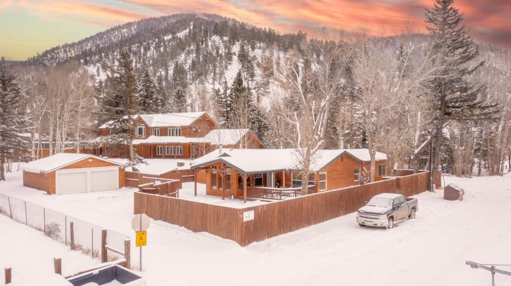Drone view of this incrediable 3 bed 3 bath right in town, single story with parking.
