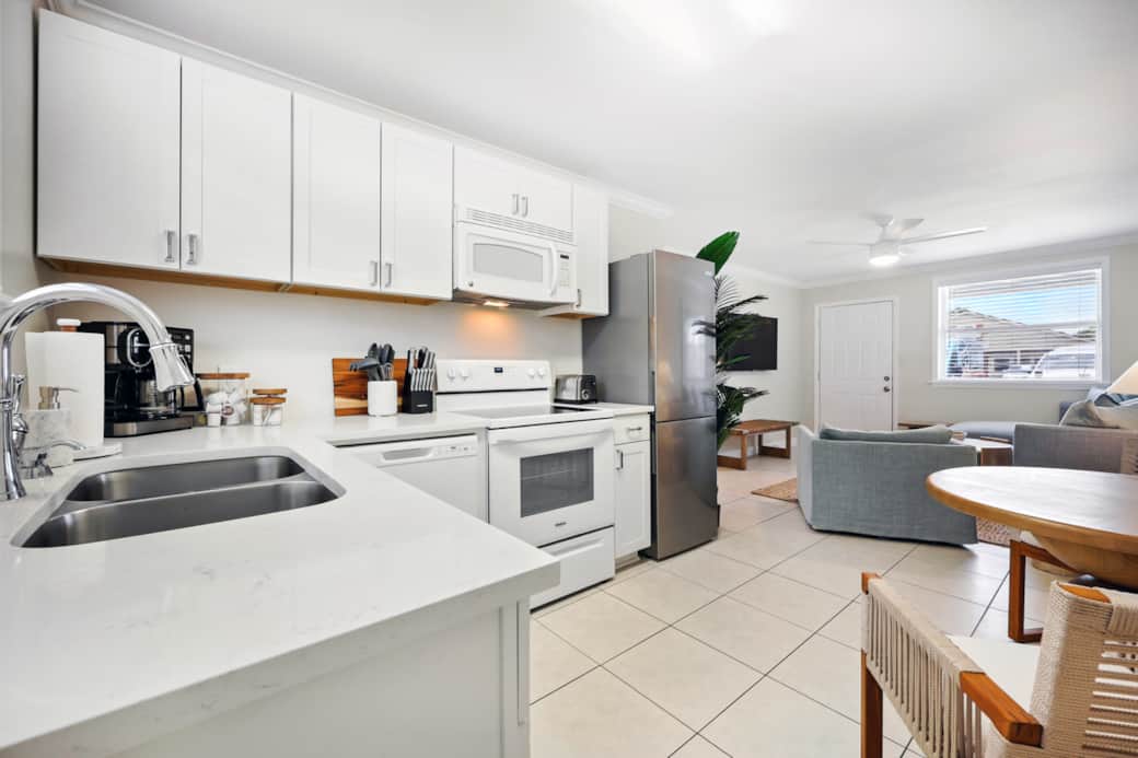 Whip up a meal in your fully equipped kitchen with table.