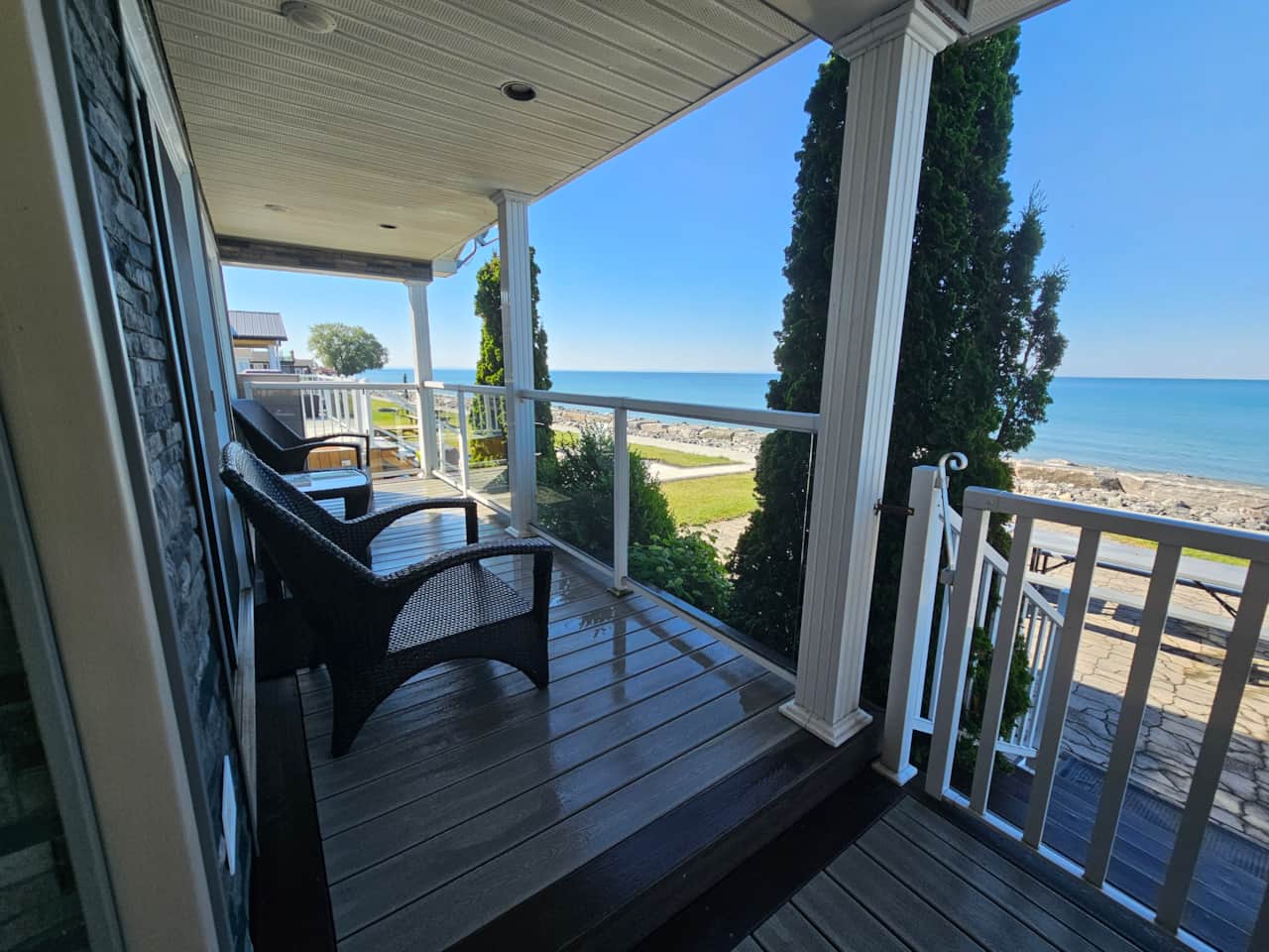 Covered deck with beach view