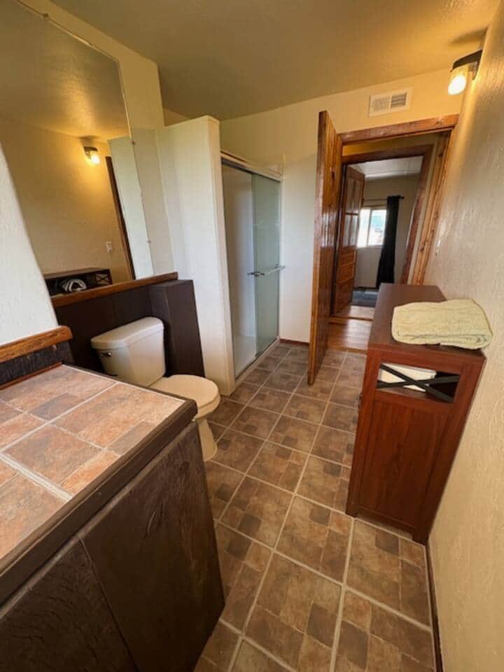 This cabin’s single bathroom is spacious.