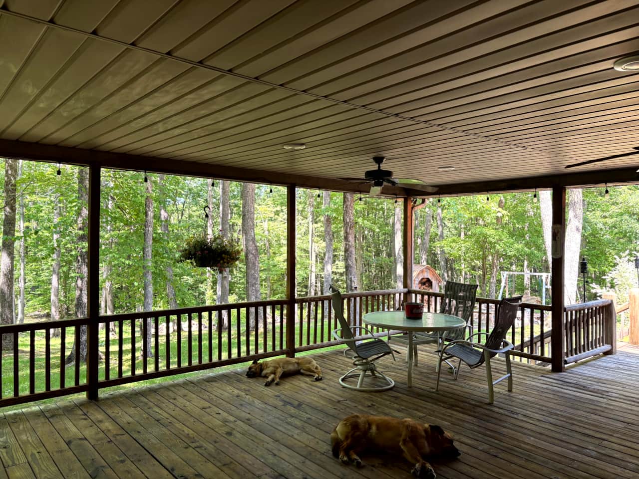 Lazy summer day in the shady woods.  Ceiling fans on the deck provide extra comfort!