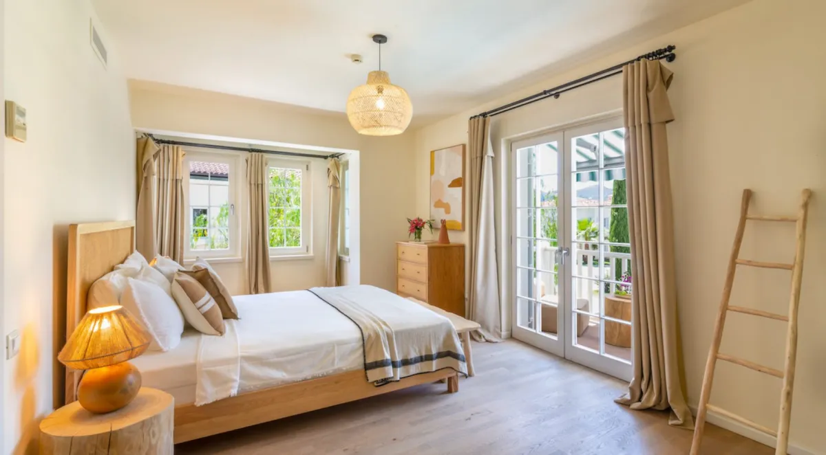 Bedroom featuring a double bed, dresser, and large windows with curtains, Portville B2 044, Gocek