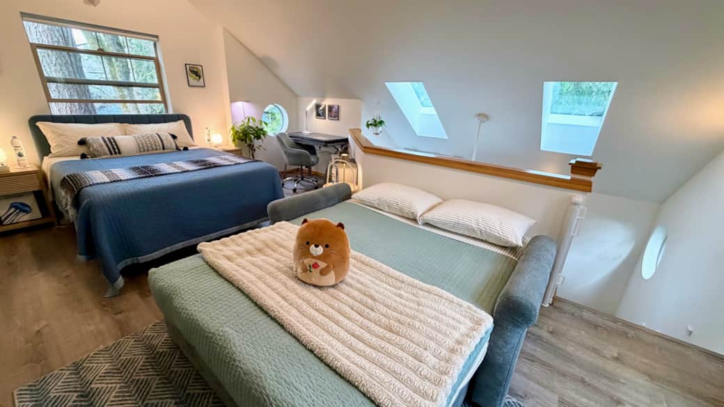 Upstairs sofa converts to a queen bed. Setup available upon request.