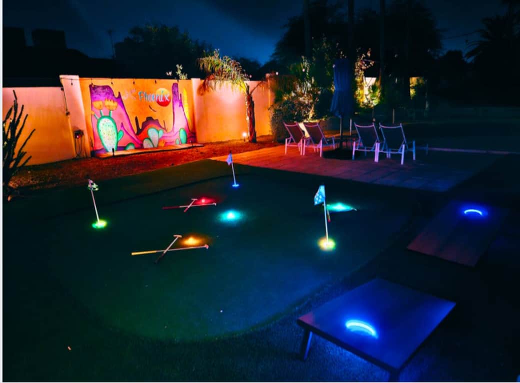Swing into fun on our tiny, glow-in-the-dark three-hole mini golf course and cornhole—where the only thing smaller than the holes is the time it takes to have a blast! Swing into fun on our tiny, glow-in-the-dark three-hole mini golf course and cornhole—where the only thing smaller than the holes is the time it takes to have a blast!