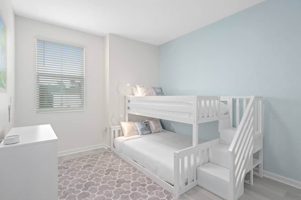 The kids bedrooms are identical bedrooms to prevent sibling rivalry

-Blackout shades 
-Sound machine
-Low profile bed for safety
-Disney décor in a calm, non-overstimulating manner
-Satin or cotton pillowcases for your child's sensory preferences