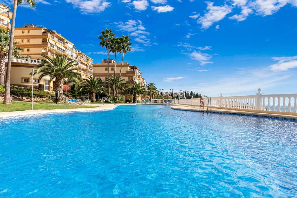 Big community pool with sea view.