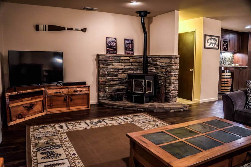 The living area contains a large 4k TV as well as a decorative pellet stove. (not for guest use)