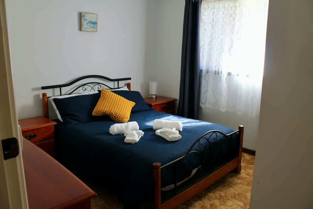 Master bedroom at Smugglers Cove holiday accommodation Esperance