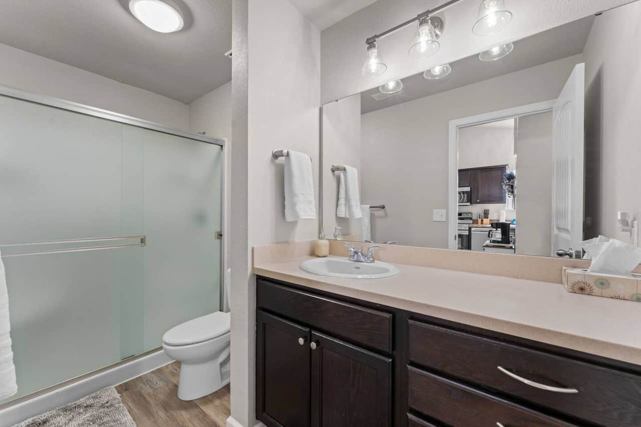 Spacious updated bathroom with walk-in shower.