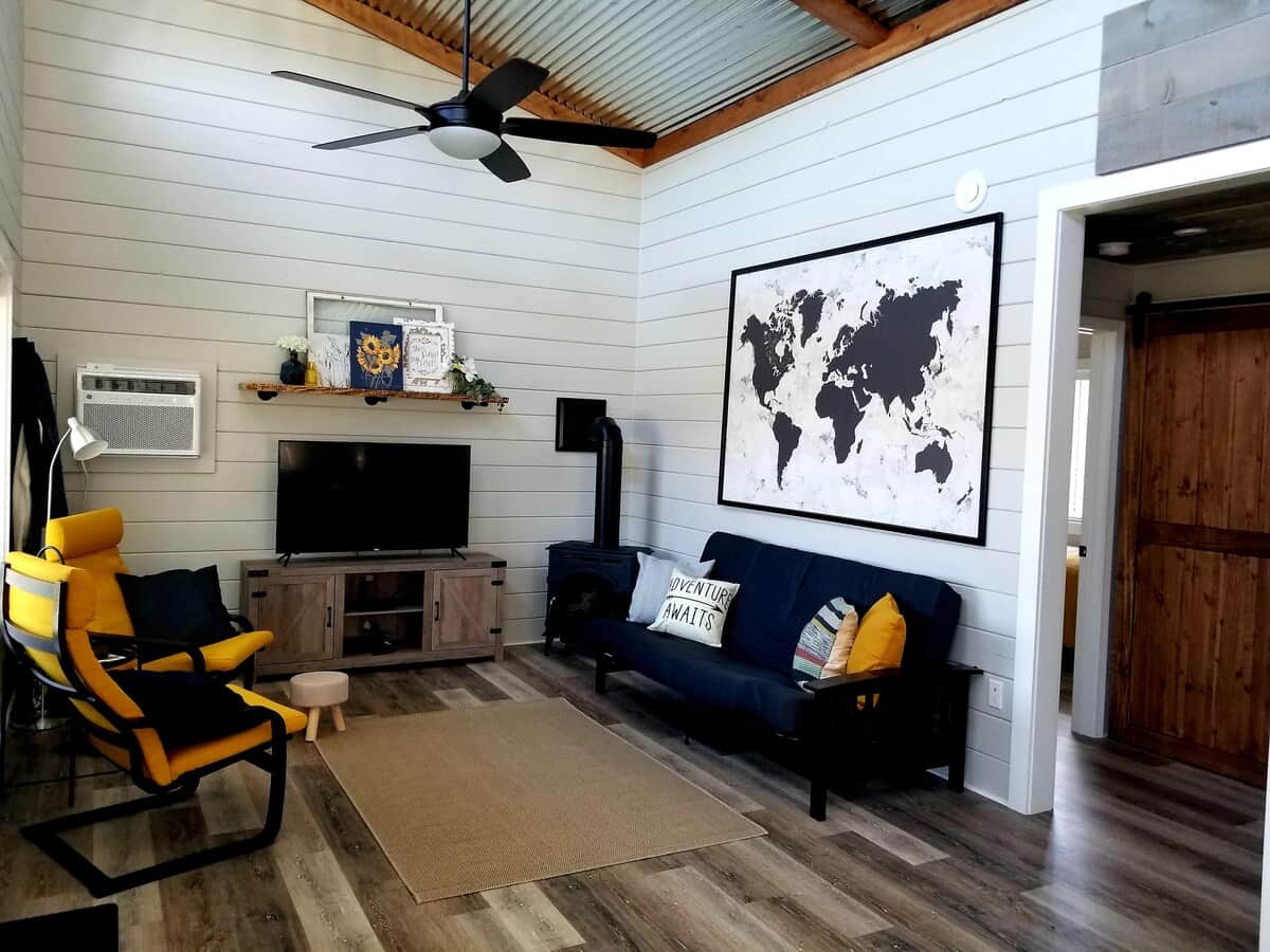 Spacious living area with tall ceilings and mountain views... 
