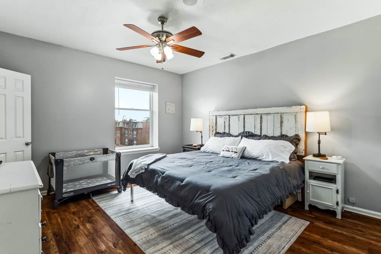The 2nd Bedroom has a King bed, room for a Pack-n-Play, and a view of the Gateway Arch & Downtown.