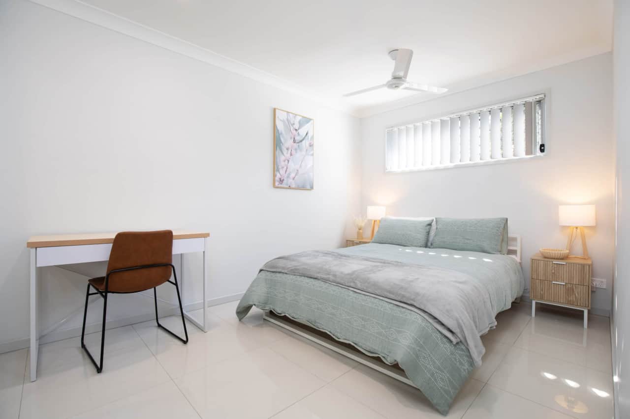 Bedroom: Peaceful bedroom with cozy design and ample storage 