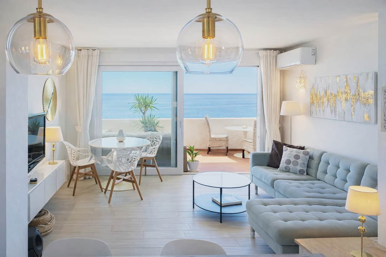Living room opening onto the sea-view terrace