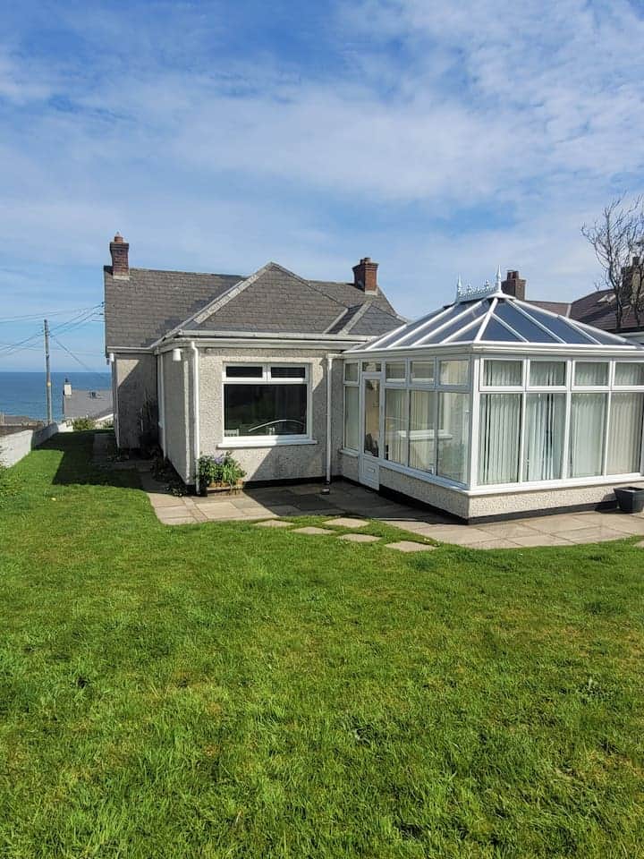 The house is approached at the back where there is a large south facing conservatory which you enter before going into the kitchen