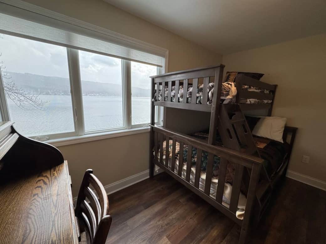 Bedroom 3 twin over full, solid wood, working desk. 