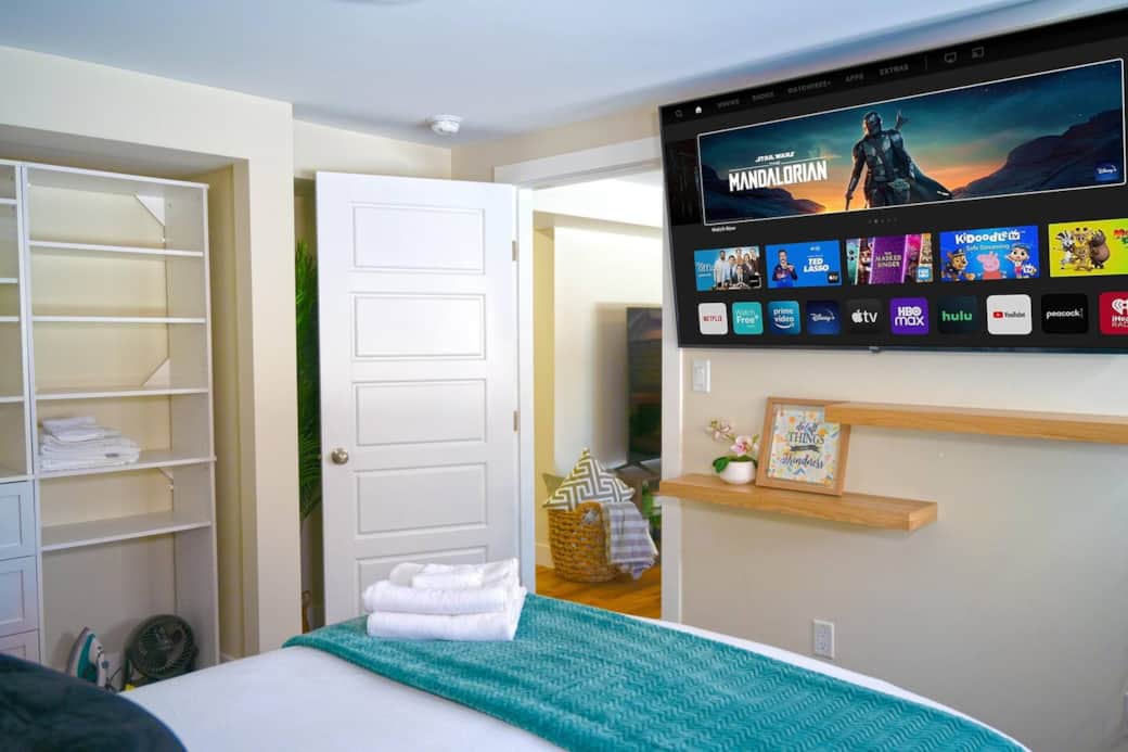 Cozy and comfortable bedroom with a plush queen-sized bed, fresh linens, and plenty of natural light. Includes a closet, bedside tables, charging stations and can’t forget the 65” TV to make you feel right at home.