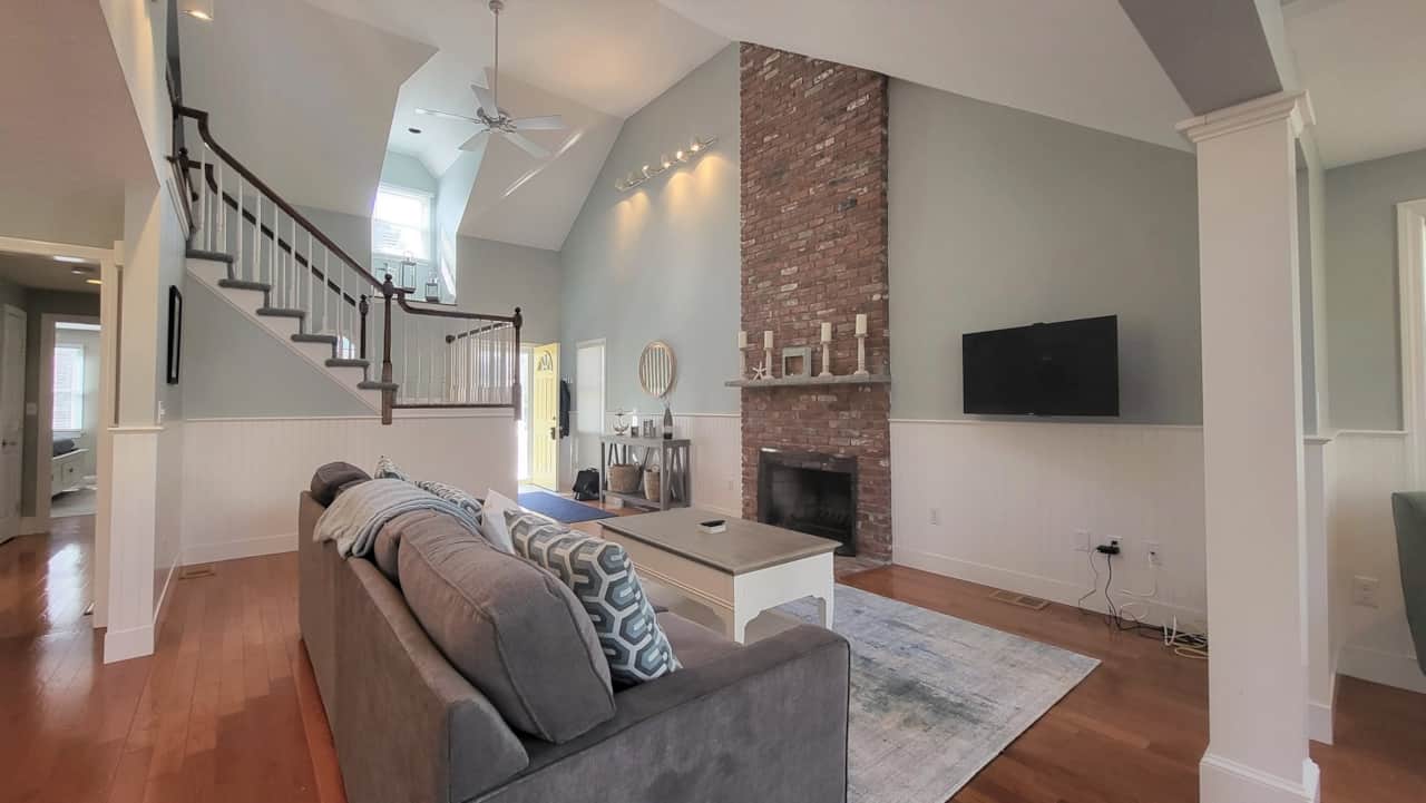 Open living area and brick fireplace
