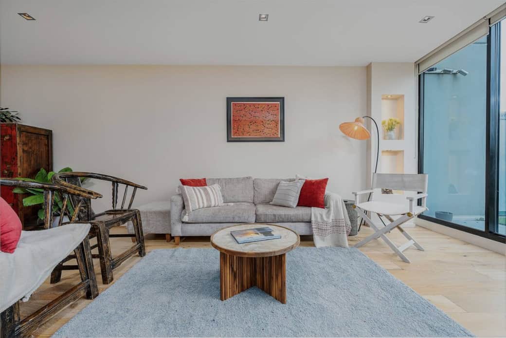 Beautifully made timber chairs. Enjoy the view outside, curl up on the sofa to read a book or watch a movie on your 75 inch TV