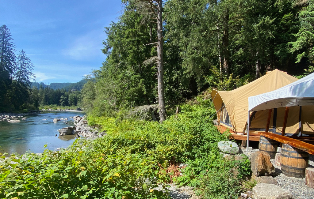 Dome tent and covered area along the river.