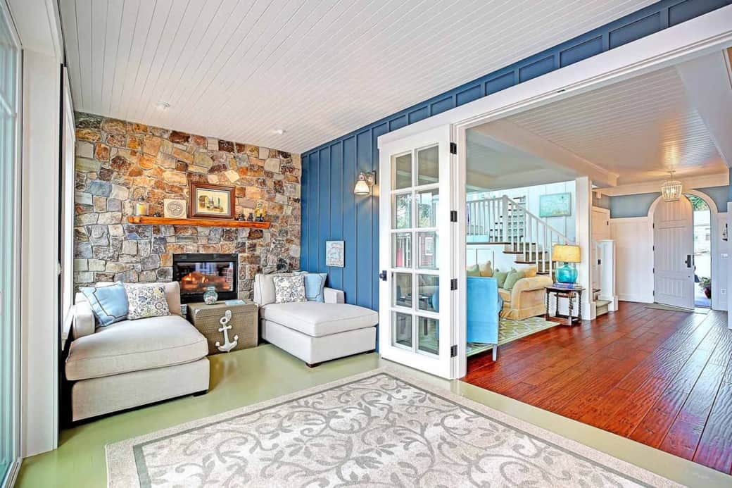 The lounge chairs next to the gas fireplace is the ideal spot to enjoy the serenity of this slice of paradise.