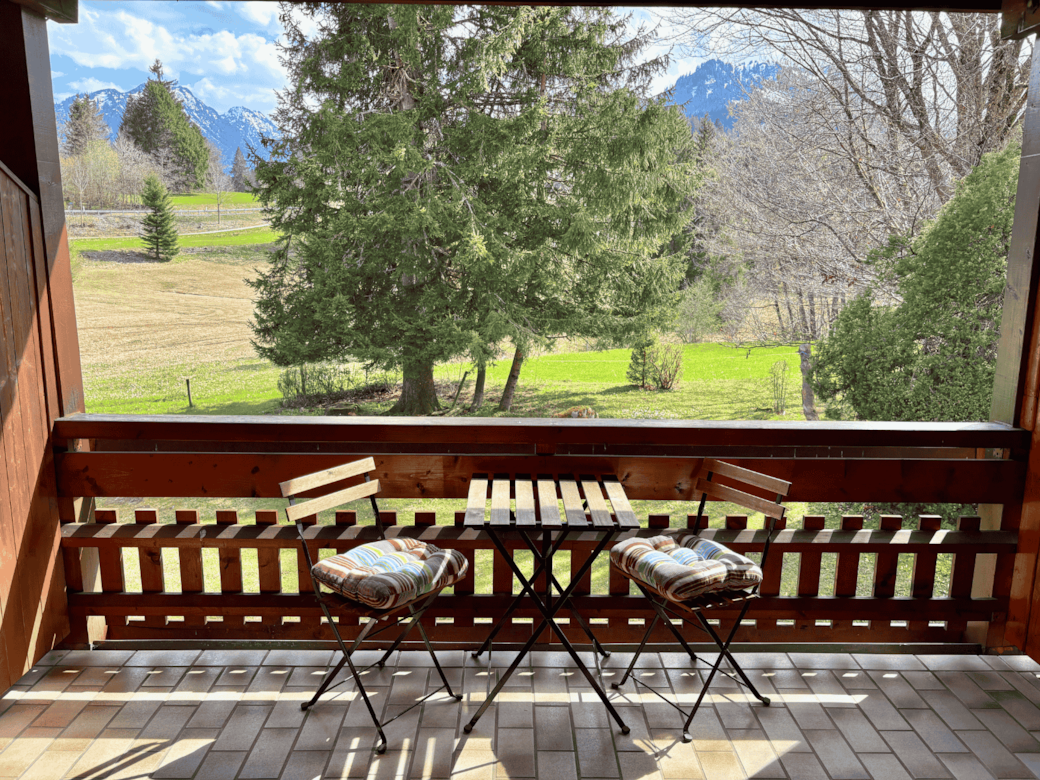 Cozy south-facing balcony with a view of the garden