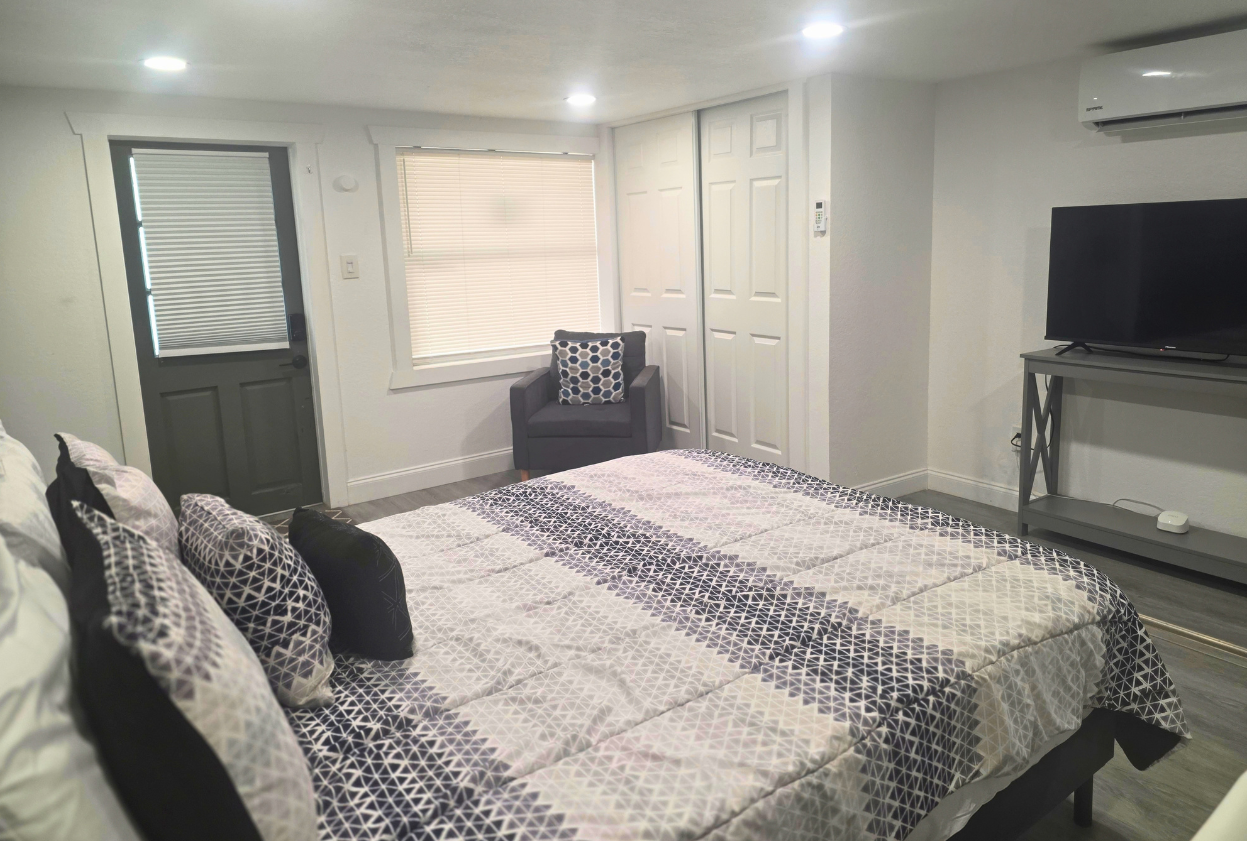 Spacious closet for belongings & cozy accent chair with pillow for relaxing or reading. Lakeland, FL