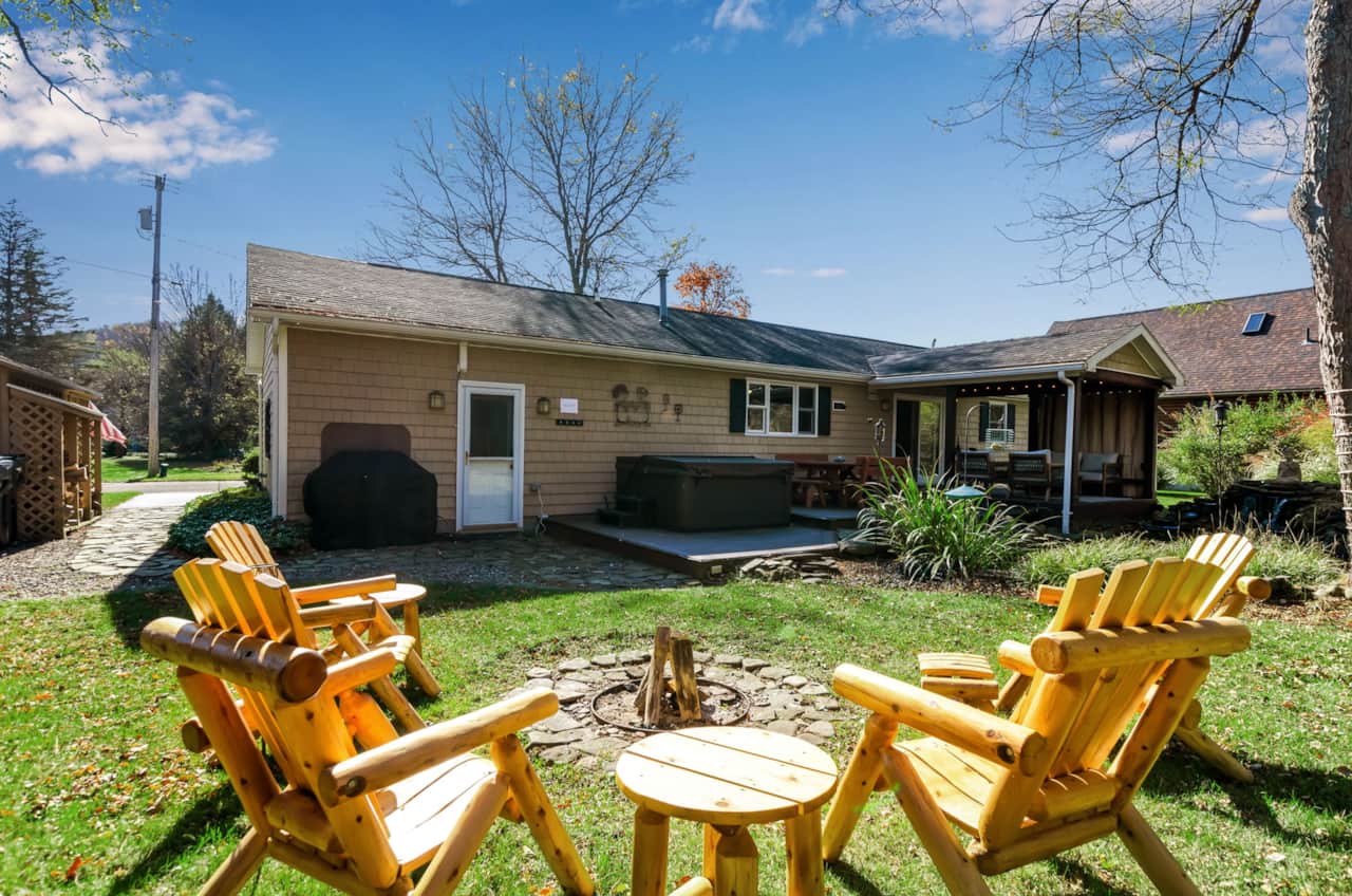 Backyard gathering space with Adirondack seating, mountain air, and room to slow down.
