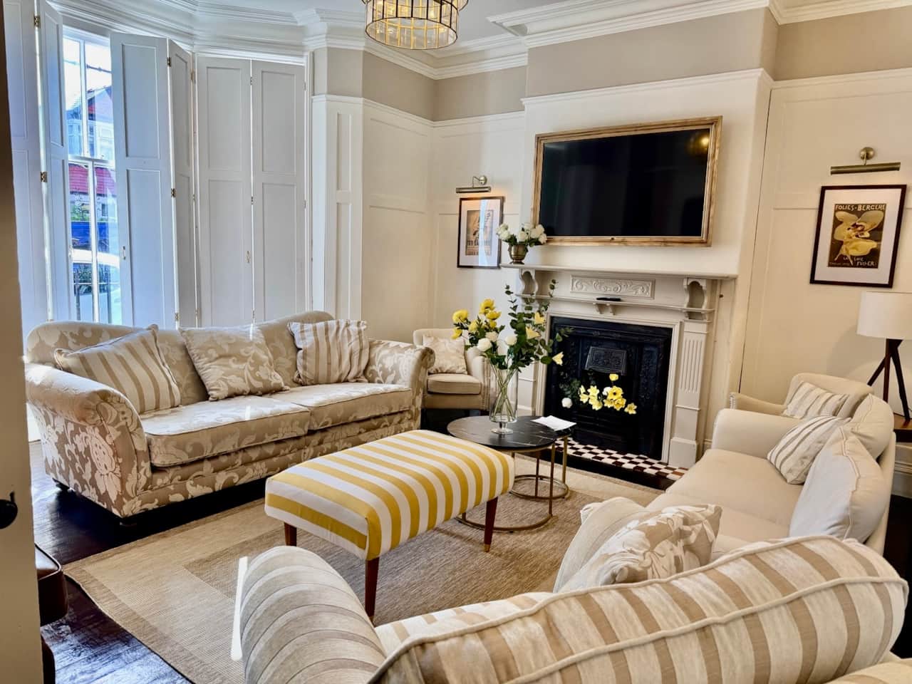 Luxe living room with games, books, smart TV with apps
