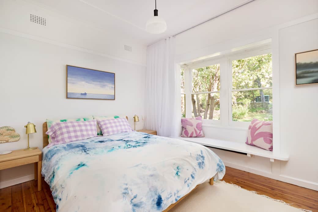 Bedroom One - Enjoy natural lighting and a comfortable queen bed, or enjoy a night reading away. Bedroom One - Enjoy natural lighting and a comfortable queen bed, or enjoy a night reading away.