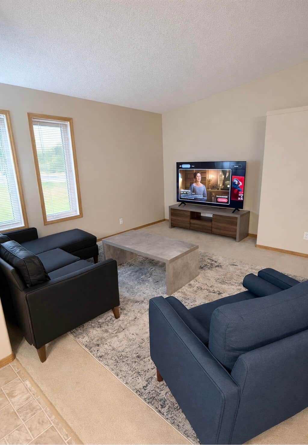 Cozy living area with flat-screen TV and plush seating