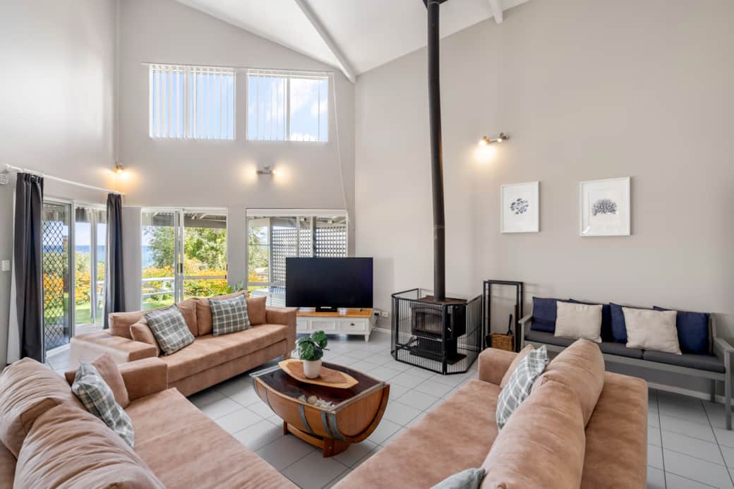 Lounge room with fireplace and smart TV Lounge room with fireplace and smart TV