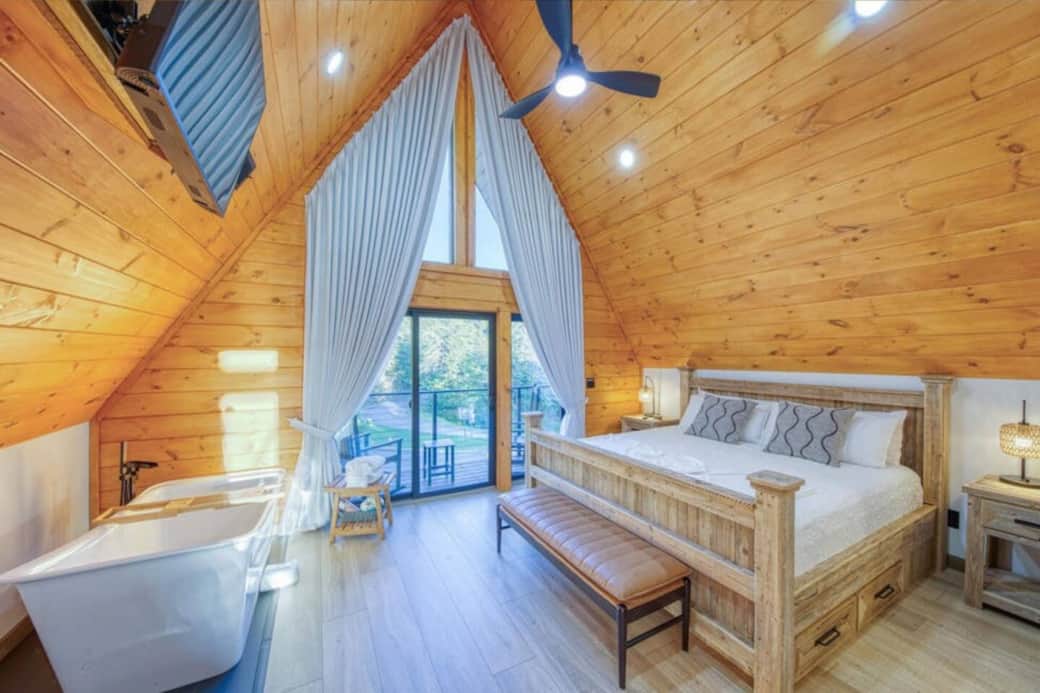 On the second floor, the spacious master suite is a true retreat: soak in the luxurious jacuzzi tub positioned to capture the sunrise through the skylights, or seclude with a book on a private balcony.