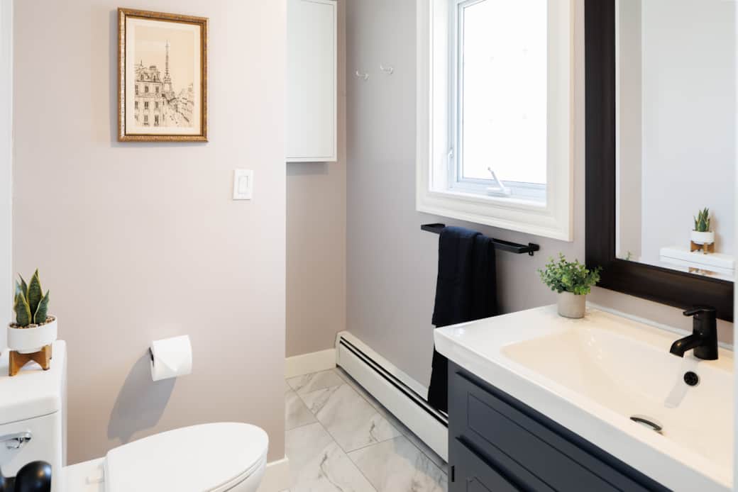 Bright ensuite bathroom with modern finishes.
