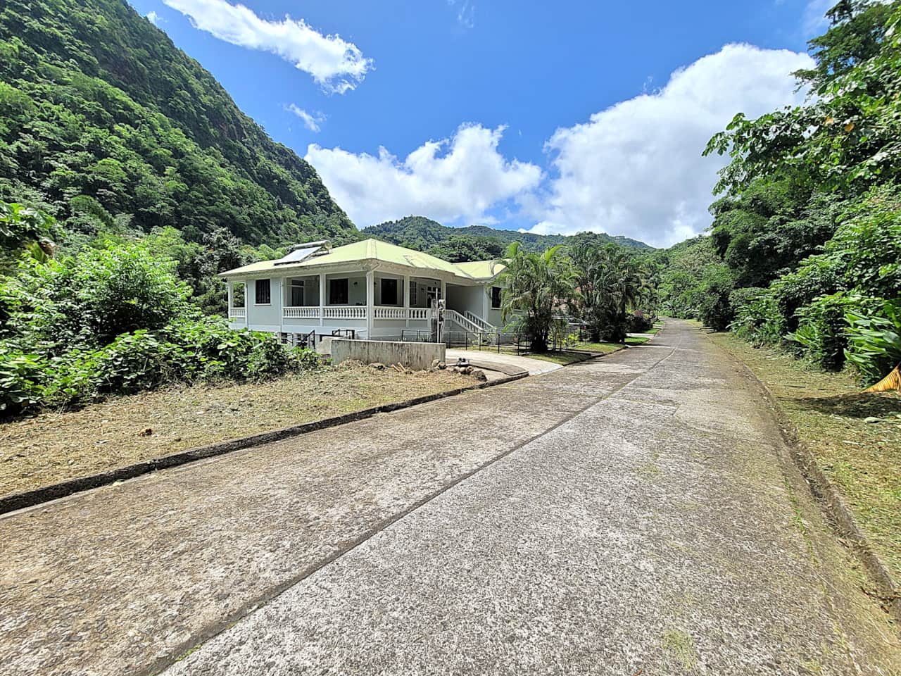 Exterior view of David & David Ltd property at Bamboo River, showing quiet street access and park.