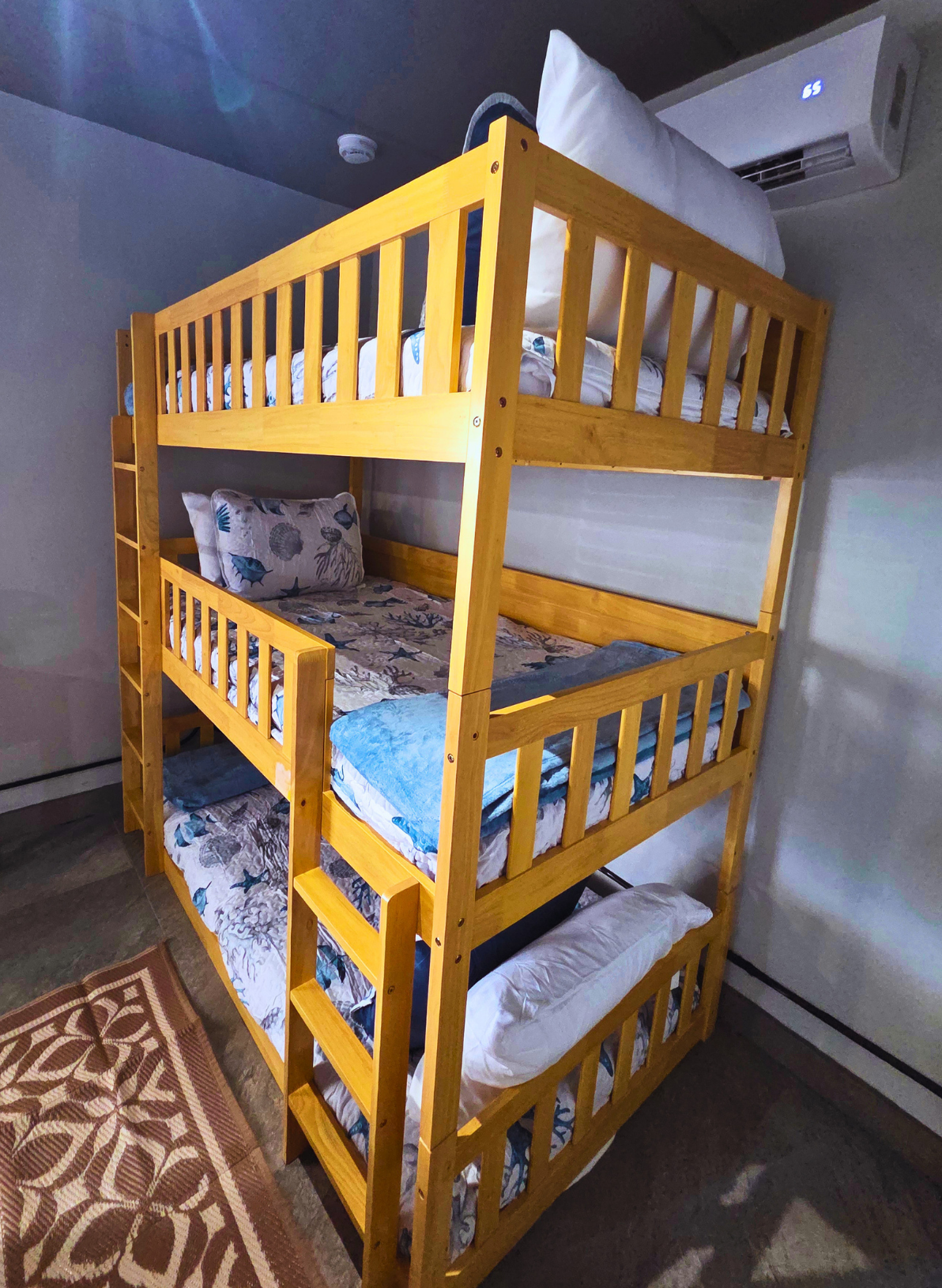 Family-friendly bunk bed for 3 with soft bedding and ample comfort. Treasure Island, FL