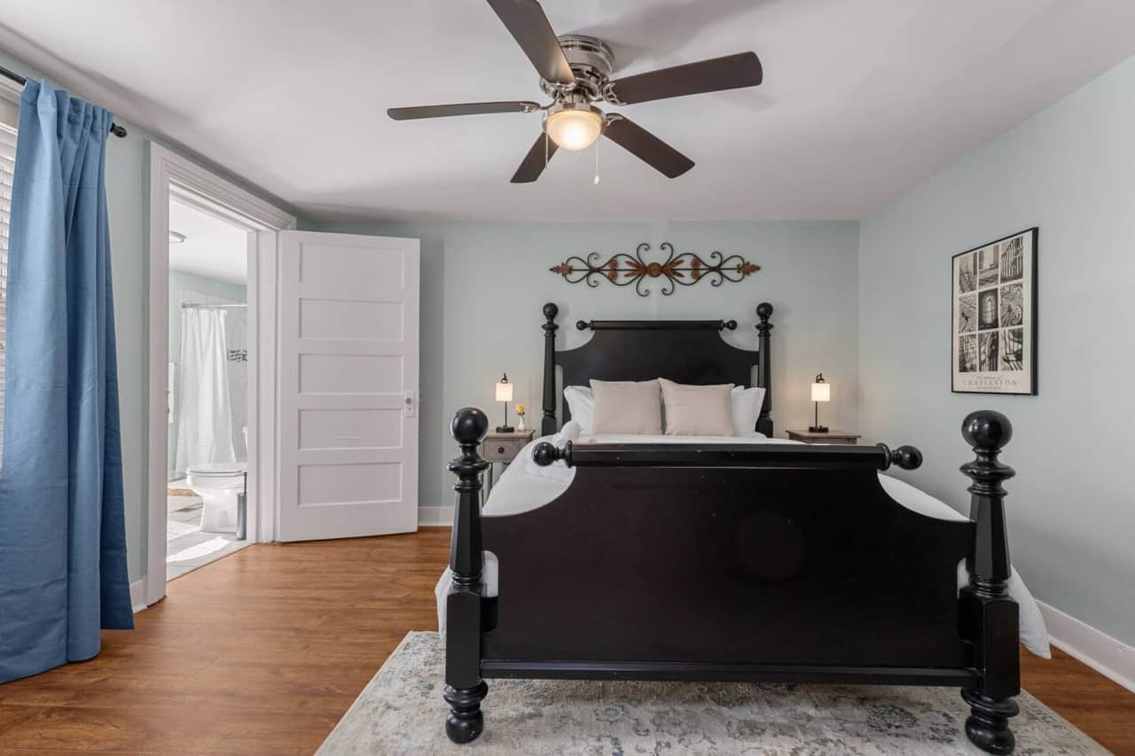 Primary bedroom with comfy Queen bed, ceiling fan and Roku TV
