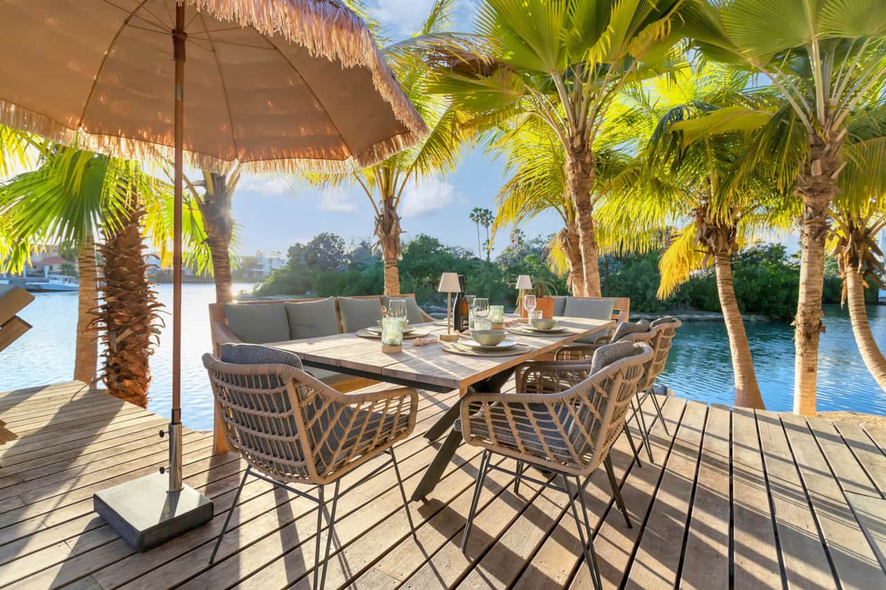 Luxury Caribbean villa Villa Paradiso with waterfront dining terrace
